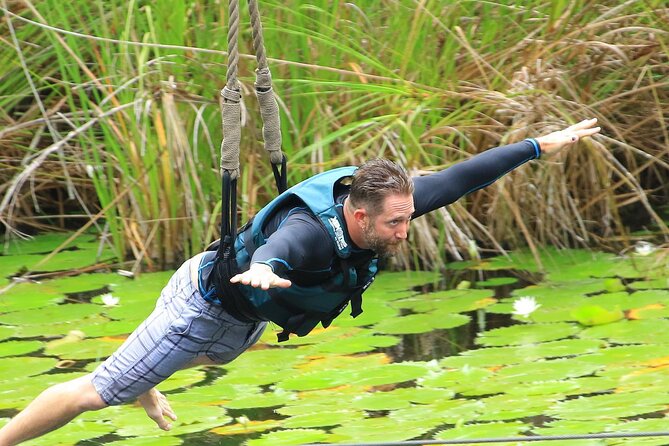Discover and Descend on the Hidden Xenotes Tour From Cancun - K’áak’ Cenote (Fire): kayak across the water