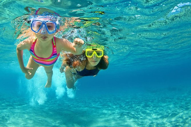 Discover Isla Contoy & Isla Mujeres: Nature, Snorkel & Beaches - Isla Mujeres: 1 hour of beach time, shops, and a calmer return