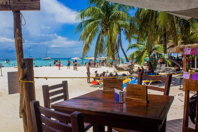 Discover Isla Mujeres: Catamaran, Snorkeling, and "Ice Bar" - Price, the $37 Tag, and the 850 MXN Pier Fees Reality