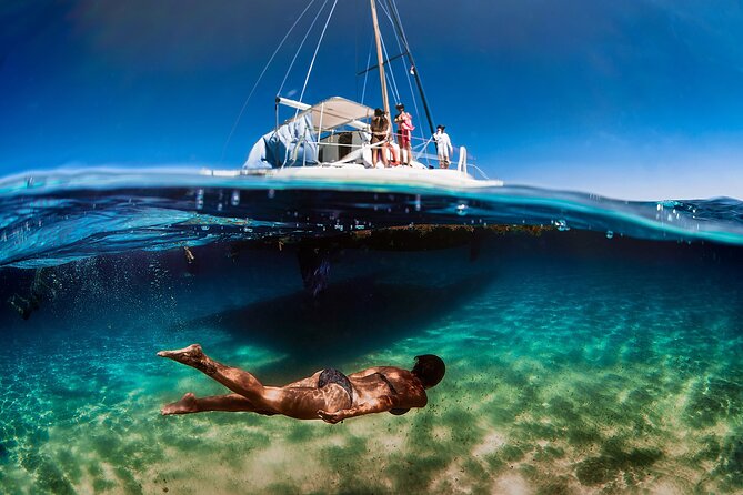 Discover Isla Mujeres: Catamaran, Snorkeling, and "Ice Bar" - Catamaran Cruise + Open Bar: Fun, But Watch the Rhythm