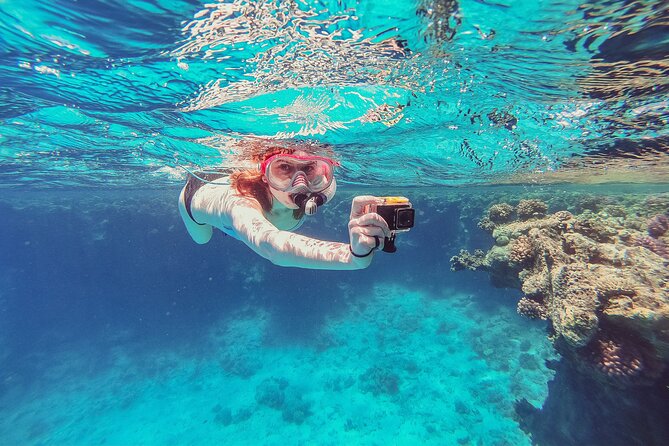 Discovering Isla Mujeres on a Double Decker Catamaran - Meet at the Cancun Lighthouse and get your timing right