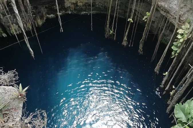 Ek Balam and Cenote Experience - Oxman Cenote (Hacienda Oxman): a semi-open swim with life vests and turquoise water