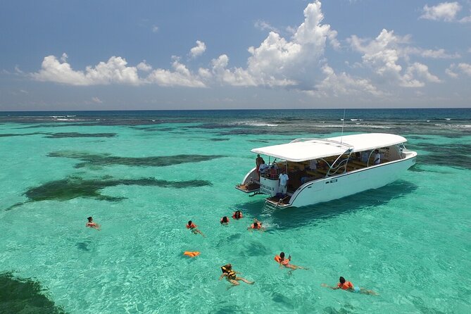 Excursion Isla Contoy & Isla Mujeres from Cancun - Snorkeling at Ixlaché Reef: clear water, plus time limits