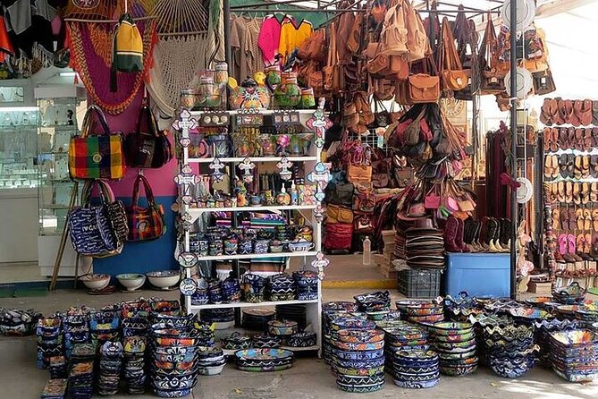 Explore Cancun City Tour! Round Bus transportation - Plaza La Fiesta shopping: outlet-style buys with real caveats