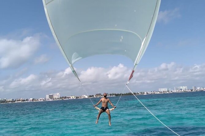 Full-Day Sailing Adventure to Isla Mujeres - Open bar and music on deck: fun perks with a planning brain