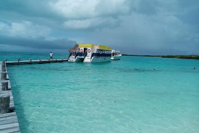 Full Day Tour to Isla Contoy and Isla Mujeres from Cancun - Isla Contoy National Park: Ixlache reef snorkeling first