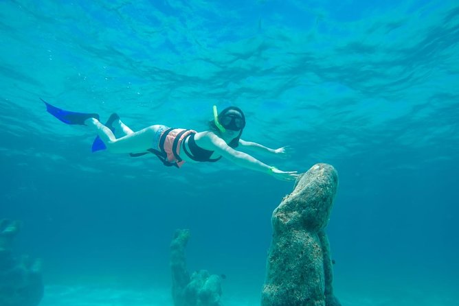 Half Day Sailing Private Catamaran to Isla Mujeres - Isla Mujeres Time: Anchor Off the North Beach or Step Ashore