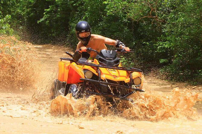 Hidden Cenote Swim & ATV Jungle Adventure with Transportation - Puerto Morelos town stop: real color, snacks, and time to wander