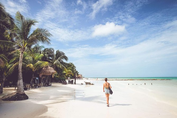 Holbox and Passion Island Full-Day Tour with Cenote, Transportation and Lunch - Holbox Island: lunch break, colorful streets, and beach time (plus bike talk)