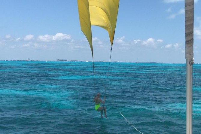 Isla Mujeres adventure by Catamaran. Snorkel, open bar and lunch - Isla Mujeres Beach Club Stop: Buffet Lunch, Open Bar, and Swim Time