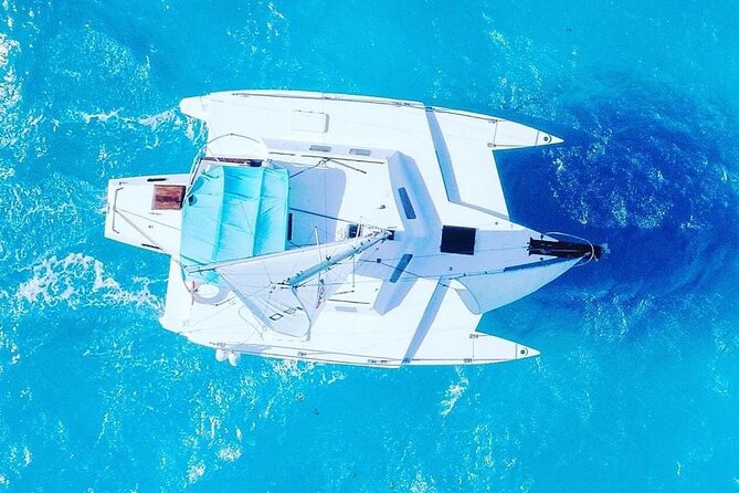 Isla Mujeres Basic Catamaran Tour with Snorkeling and Open Bar - Cancun to Isla Mujeres by catamaran: what the day feels like