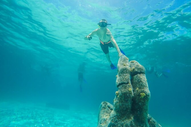 Isla Mujeres Catamaran Luxury Sailing Experience from Puerto Morelos - Playa Norte: iconic beach time without the planning stress