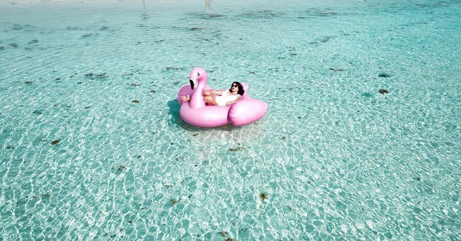 Isla Mujeres: Catamaran Ride with Open Bar, Snorkeling, and Lunch - Playa Norte and the beach club: where the trip turns into beach time