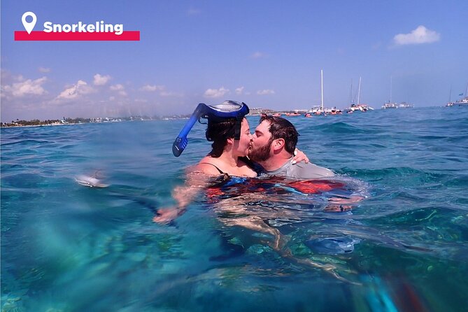 Isla Mujeres Catamaran + Snorkel + Open Bar on board + Buffet - Cruising and onboard time: open bar, snorkel gear, and spinnaker risk