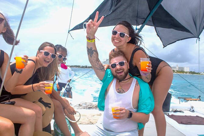 Isla Mujeres Catamaran Tour from Cancun with Snorkel and Open Bar - Sailing time: open bar, deck energy, and the spinnaker maybe