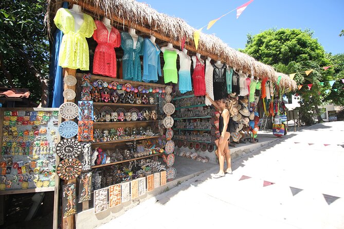 Isla Mujeres Catamaran Tour with Open Bar, Lunch and Snorkeling - Isla Mujeres beach club and buffet lunch: convenience with mixed results