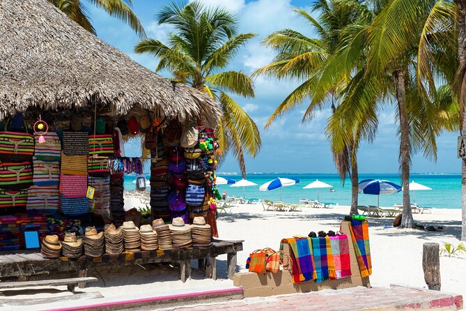 Isla Mujeres Catamaran Tour with Snorkel, Open bar and Transport - Open bar, music, and the buffet: fun factor depends on your expectations