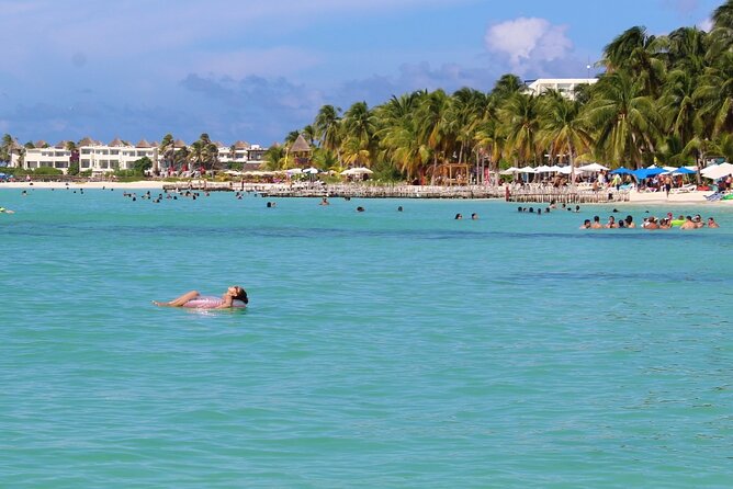 Isla Mujeres Catamaran Tour with Snorkeling at MUSA, Buffet Lunch & Open Bar - Playa Norte swim: the final ocean moment before heading home