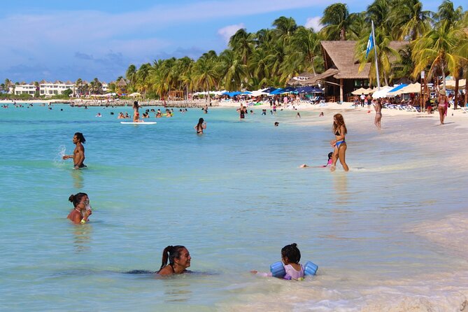 Isla Mujeres Catamaran Tour with Snorkeling at MUSA, Buffet Lunch & Open Bar - Isla Mujeres on your own: shopping, plaza time, and Playa Norte vibes