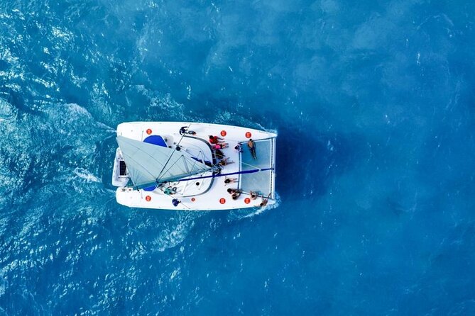 Isla Mujeres: Catamaran Tour with Snorkeling Food, Drinks, Beach - Snorkeling gear included: how to get better sightings fast