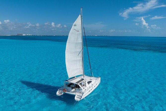 Isla Mujeres Day Tour with Catamaran, Snorkeling & Beach Club - H2: Getting to the marina: easy start, but check-in can feel like a zoo