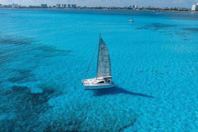 Isla Mujeres Day Tour with Catamaran, Snorkeling & Beach Club - H2: Isla Mujeres free time: Playa Norte beauty and downtown shopping energy