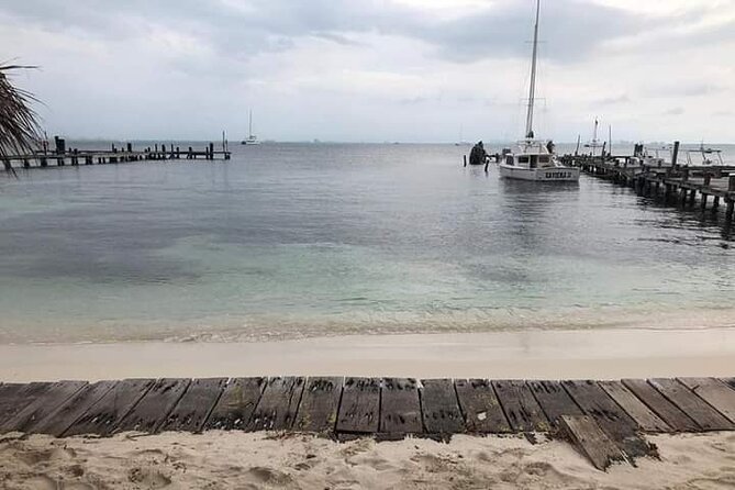 Isla Mujeres Premium Tour in Catamaran with Snorkel and Buffet - Sunset return to Cancun: music, drinks, and optional spinnaker flight