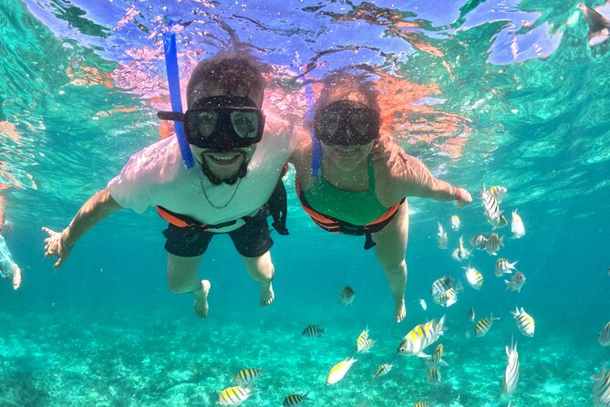 Isla Mujeres Spring Break Party Catamaran Snorkel and Open Bar - The Stops That Matter: Playa Tortugas, Isla Mujeres, Playa Norte, and Playa Centro