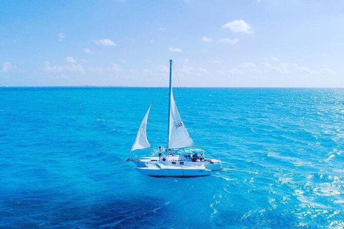 Isla Mujeres Tour in Private Catamaran with Snorkel and Lunch - First Stop at Playa Tortugas: What to Expect Before the Water
