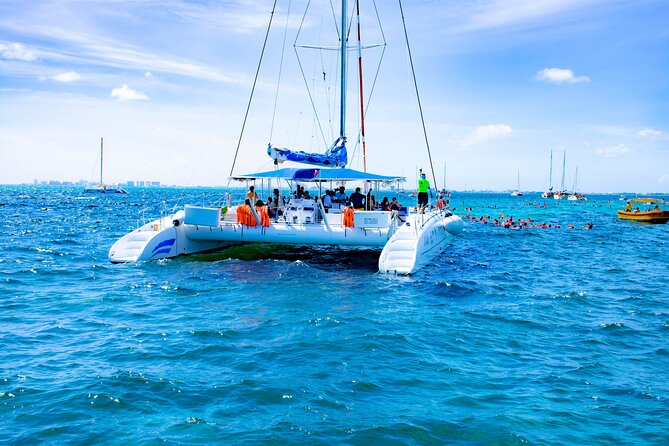 Isla Mujeres Tour on Catamaran with Snorkel, Open Bar, Buffet & Beach club - A 7-hour catamaran day to Isla Mujeres (with sunset return)