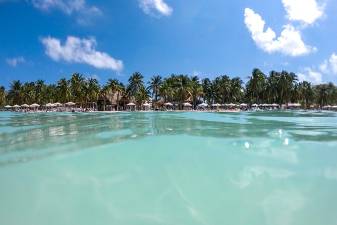 Isla Mujeres Tour on Catamaran with Snorkel, Open Bar, Buffet & Beach club - Isla Mujeres on your own: murals, monuments, and your best self-guided plan