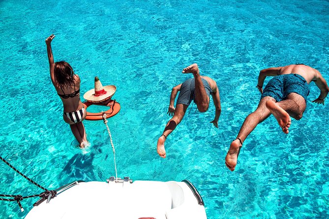 Isla Mujeres Tour on Catamaran with Snorkel, Open Bar, Buffet & Beach club - Price and logistics: what $77 is buying—and what to budget for