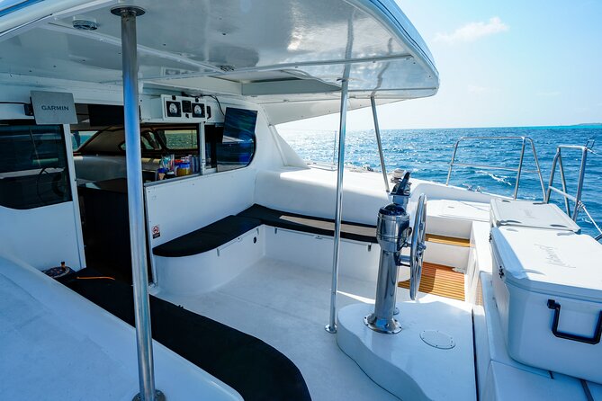 Laura Catamaran Private Tour to Isla Mujeres - Sunset return to port: how the timing shapes the mood