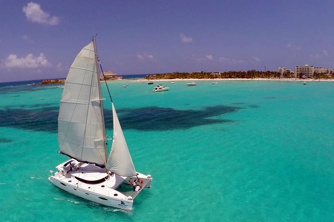 Live The Luxury Catamaran Isla Mujeres Tour in Cancun - Boarding day on the catamaran: comfort, group size, and onboard energy