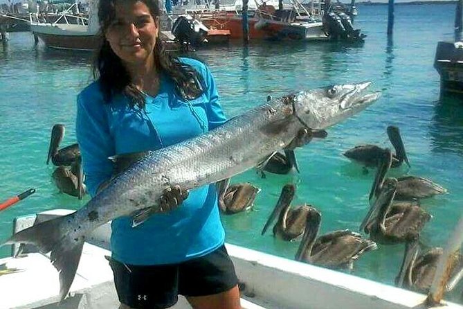 Local Fishing Plus Snorkeling Tour in Isla Mujeres - Price and logistics: $408.58 per group, plus one small extra