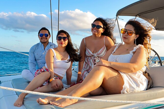 Luxury Sunset Sailing Cruise in Cancun with Light Dinner and Open Bar - Photos Onboard: Worth It or Easy to Skip