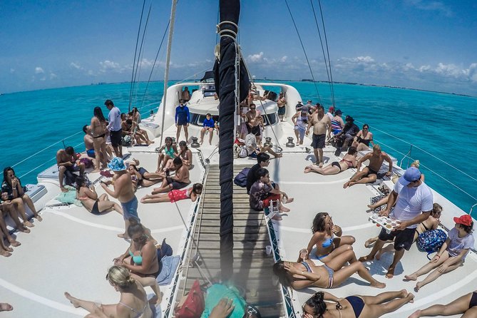Mujeres Island Tour by Catamaran from Cancun City - The Playa Tortugas catamaran stop: views, gear, and realistic snorkeling expectations