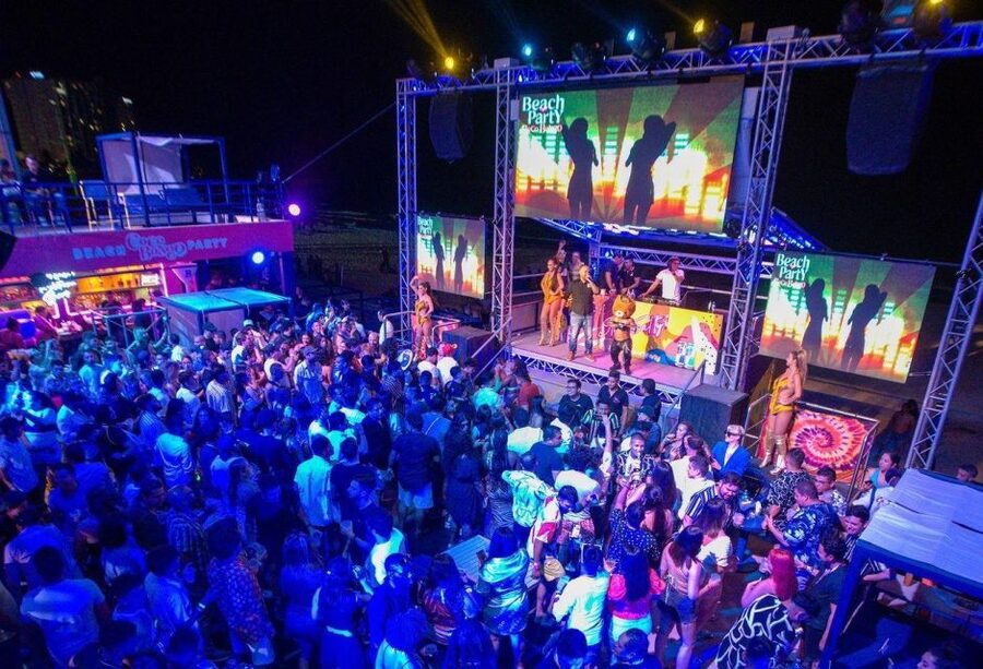 Neon Glow night Beach Party Regular - The DJs, the MC, and the Fire-and-Pyro Show Moment