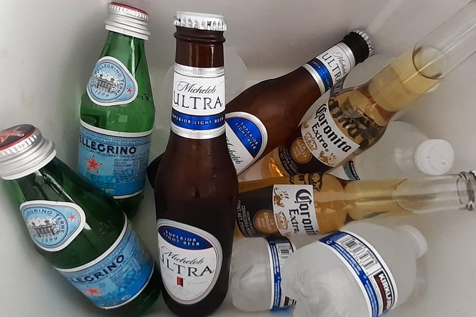 One-way Airport Transfer to Cancun or Playa del Carmen - Wi‑Fi, Bluetooth Spotify Music, and Drinks That Beat the Jet Lag