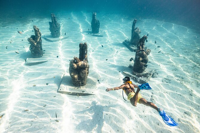 Parasailingcancun and Jet Ski tour over Cancun Bay - Snorkeling on calm-ish water: structured stops, clear expectations