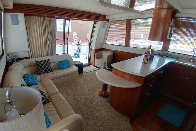 Playa Mujeres rent a Yacht 4hrs with Food and drinks aboard CA55 - Stop 1: depart Cancun coast and settle into boat time