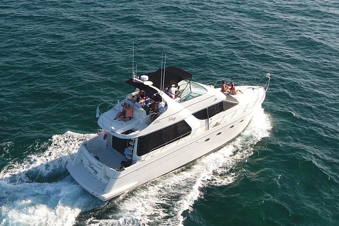 Playa Mujeres rent a Yacht 4hrs with Food and drinks aboard CA55 - Crew, communication, and the private-together feeling