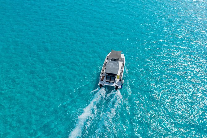 Private Atomic Catamaran Tour to Isla Mujeres - Key highlights you’ll care about