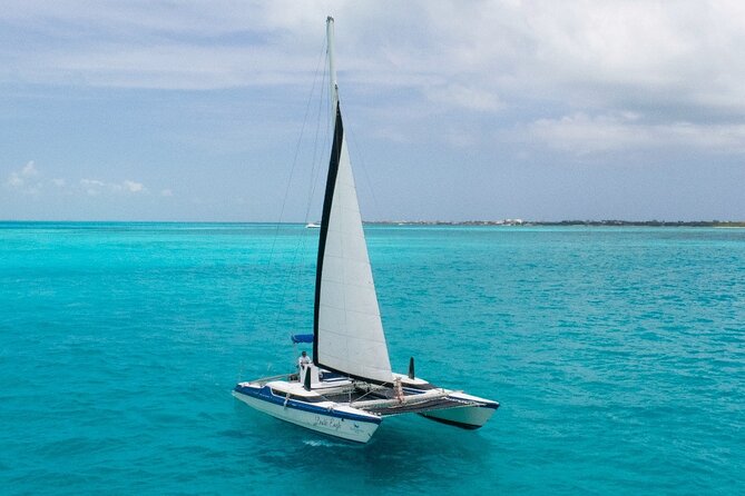 Private Catamaran Experience from Cancun to Isla Mujeres! - El Meco Reef Snorkeling: 35 Minutes, Gear Included, Rules Apply