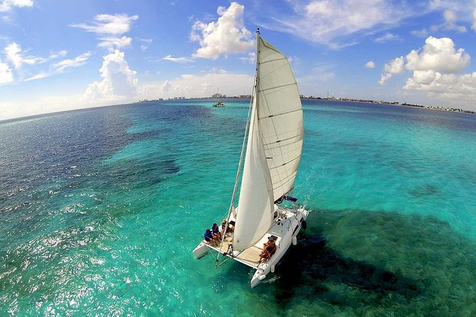 Private Catamaran from Cancun to Isla Mujeres for up to 13 People - Open Bar Energy: How Unlimited Drinks Changes the Mood