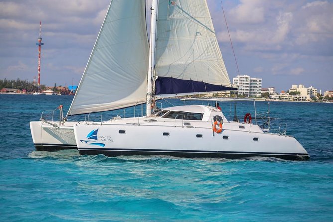 Private Catamaran from Cancun to Isla Mujeres | For up to 40 pp - The Spinnaker Experience: A Fun Risk-Free Thrill (If Conditions Allow)