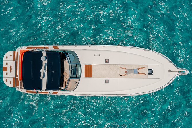 Private Luxury Yacht 55FT Rental in Cancun - 4 Hours: Playa Norte at Isla Mujeres Plus Snorkel Stops