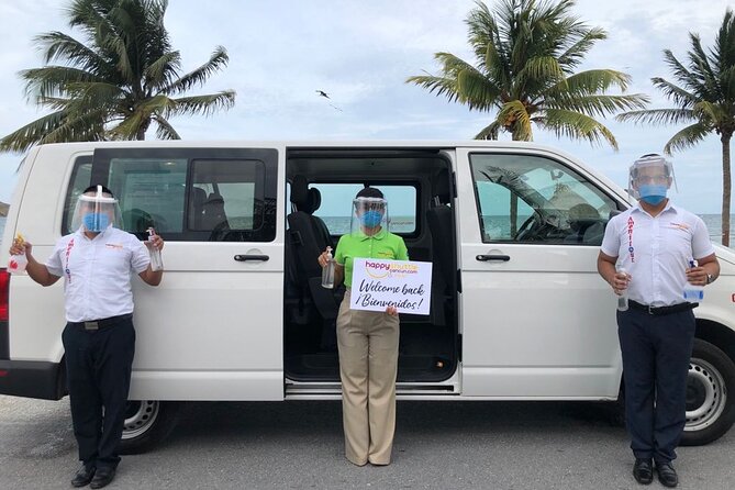 Private Roundtrip Transportation from Cancun Airport to Ferry Isla Mujeres - Your return pickup: the driver waiting at the main exit