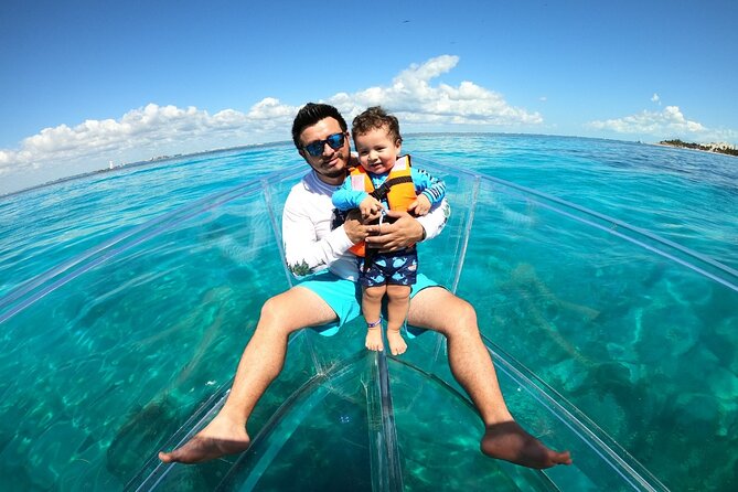 Private Tour Isla Mujeres excursion in Transparent Boat - El farito reef: colorful fish viewing at the pace of the boat