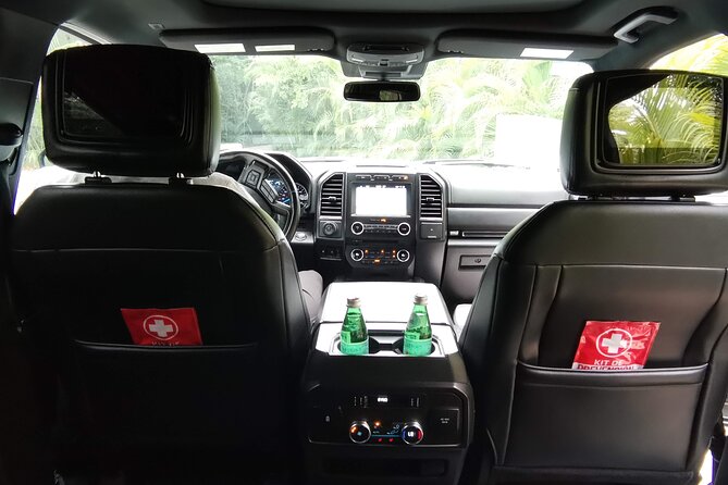 Private Transportation Deluxe Van - Cancun International Airport meet-up: Butler On The Go and the sign system